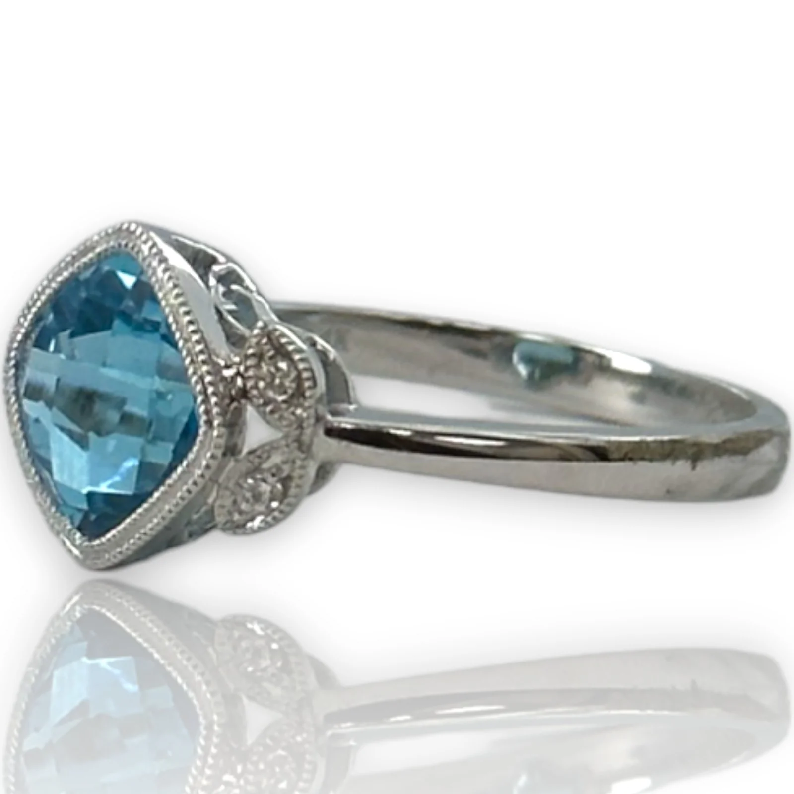 Legacy Custom Jewelers Solid 14kt White Gold and Checkerboard Cut Bezel Set Blue Topaz Ring with Diamond Leaf Milgrain Details Size 7 - Image 3
